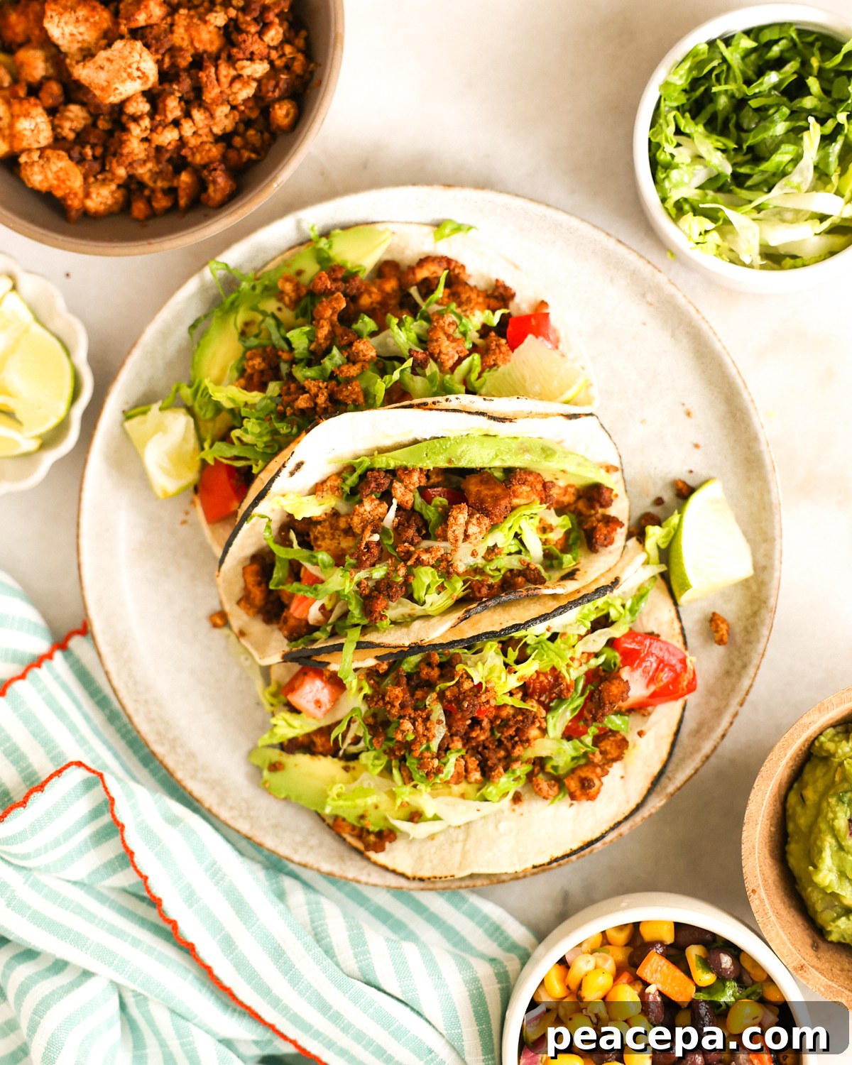 overhead of tofu tacos on plate