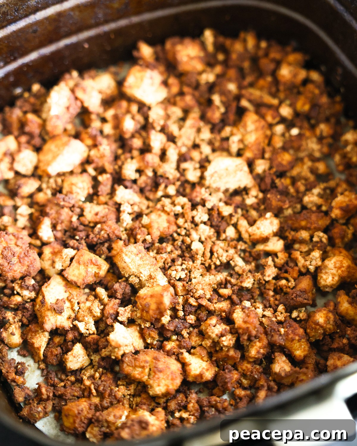 close up of tofu in air fryer