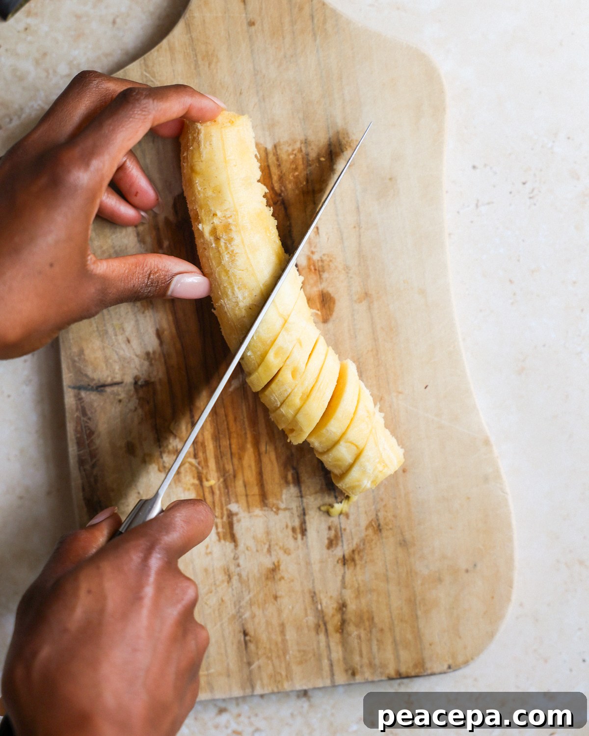 overhead slicing the plantain