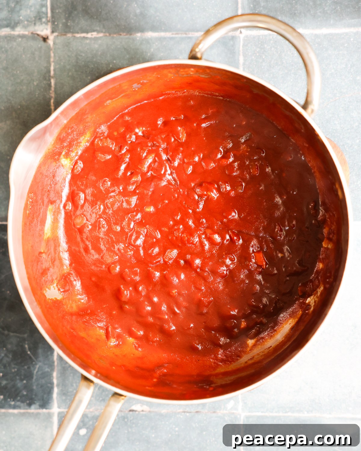 A pan of the simmered vegan BBQ sauce before blending.