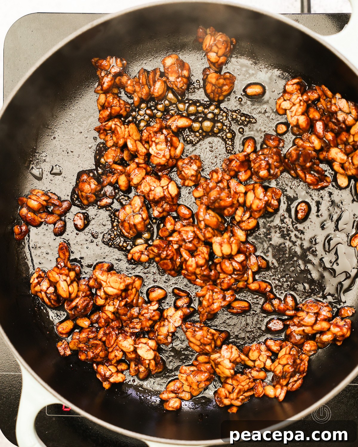tempeh sautéing in pan