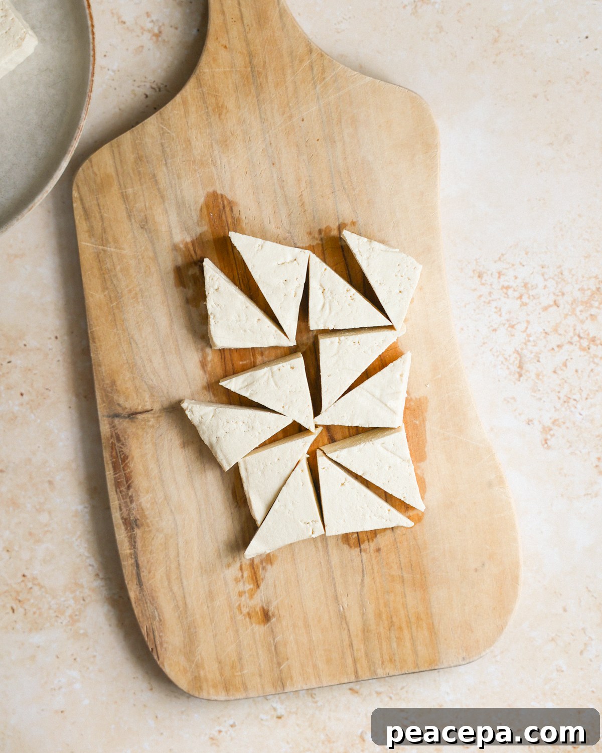 sliced tofu on cutting board