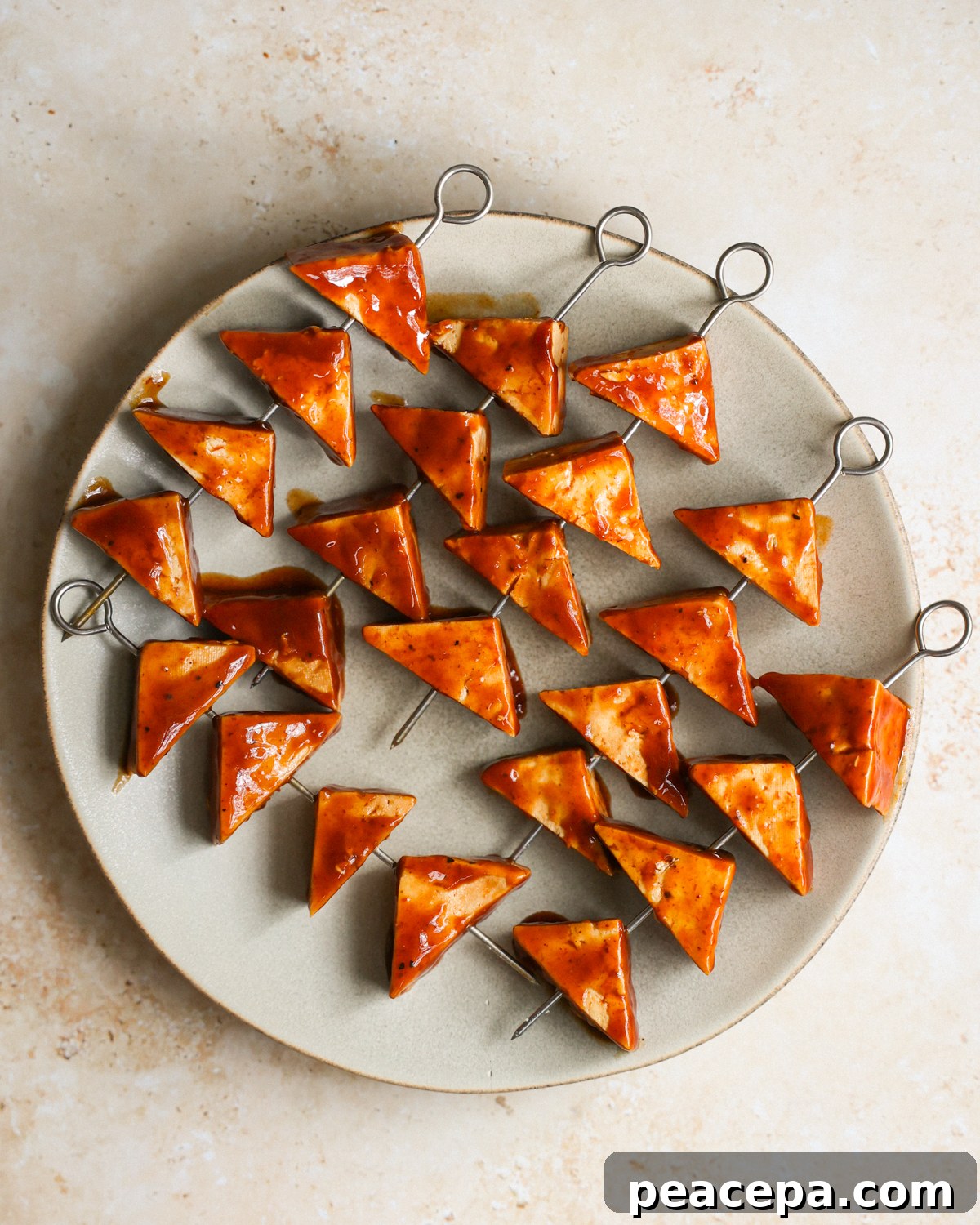 overhead marinated tofu on skewers