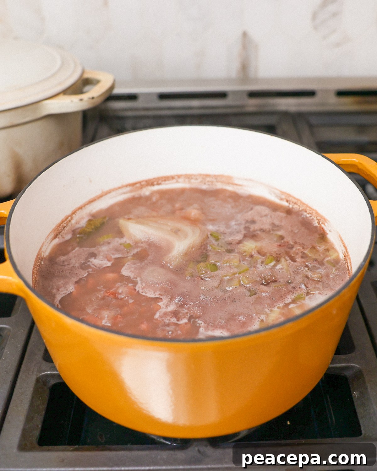 Beans simmering in a pot.