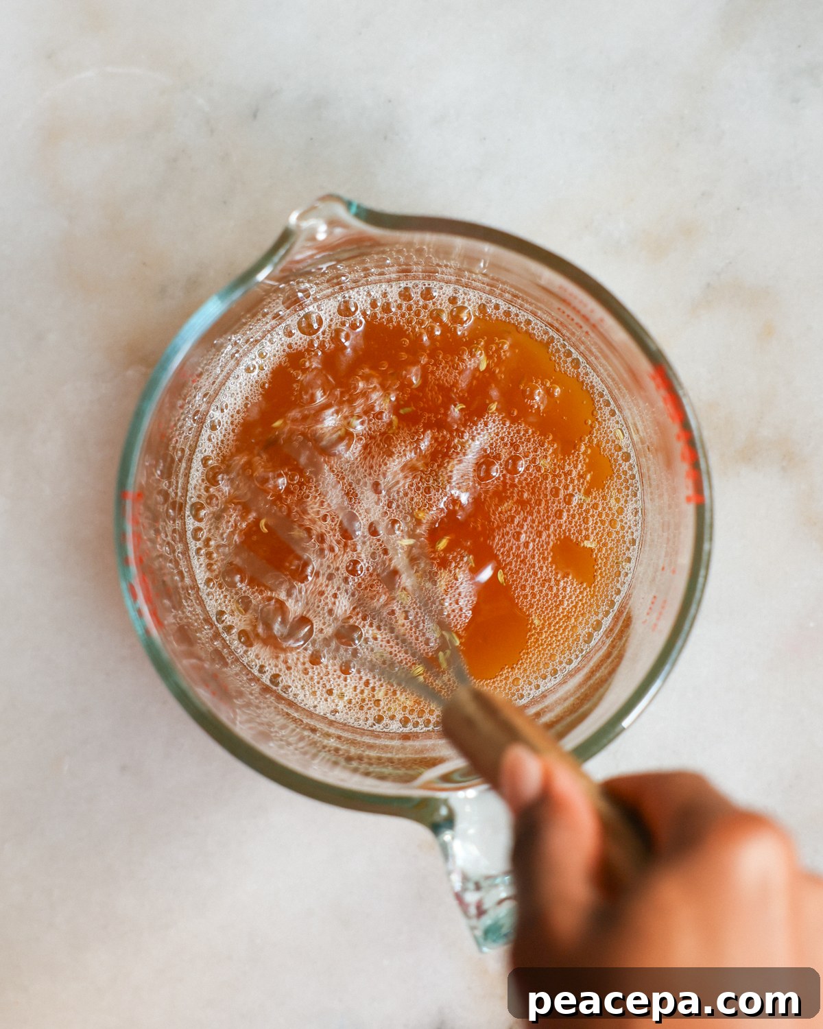 whisking the pickling liquid ingredients