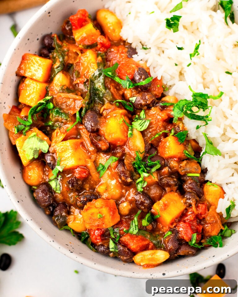 Sweet Potato Black Bean Chili and rice in a bowl.