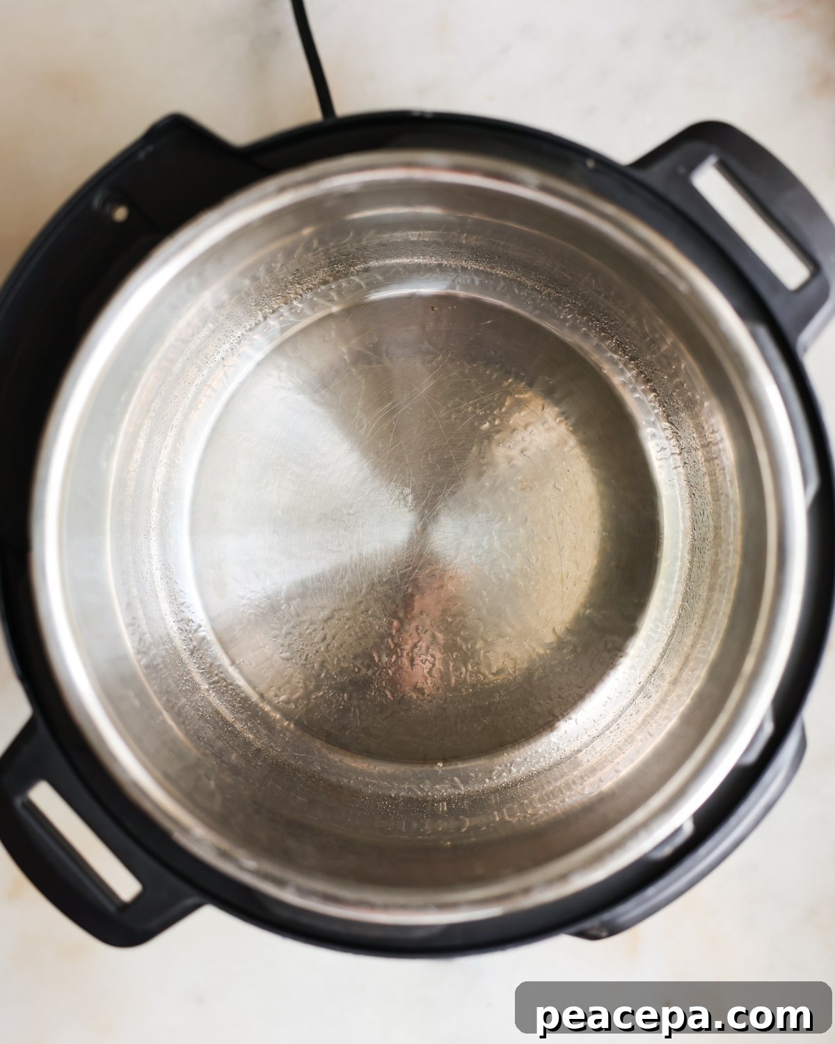 overhead instant pot sprayed with oil
