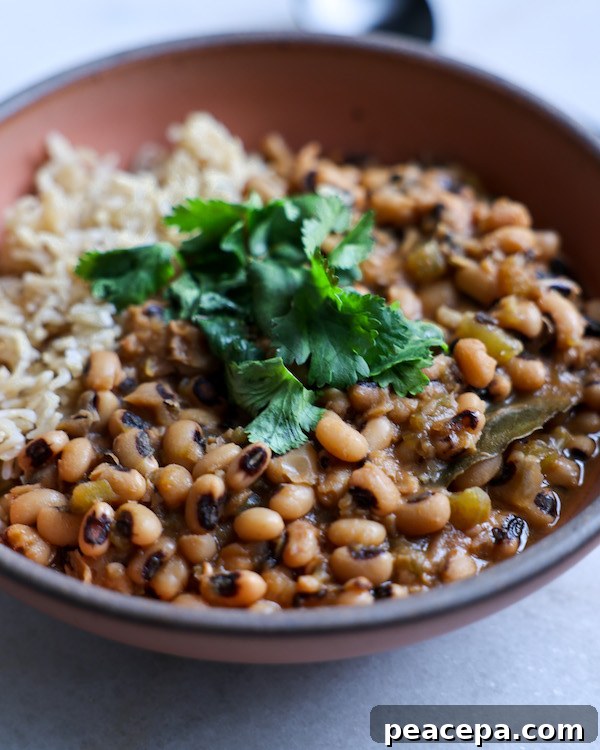Bowl of Vegan Black Eyed Peas with rice.