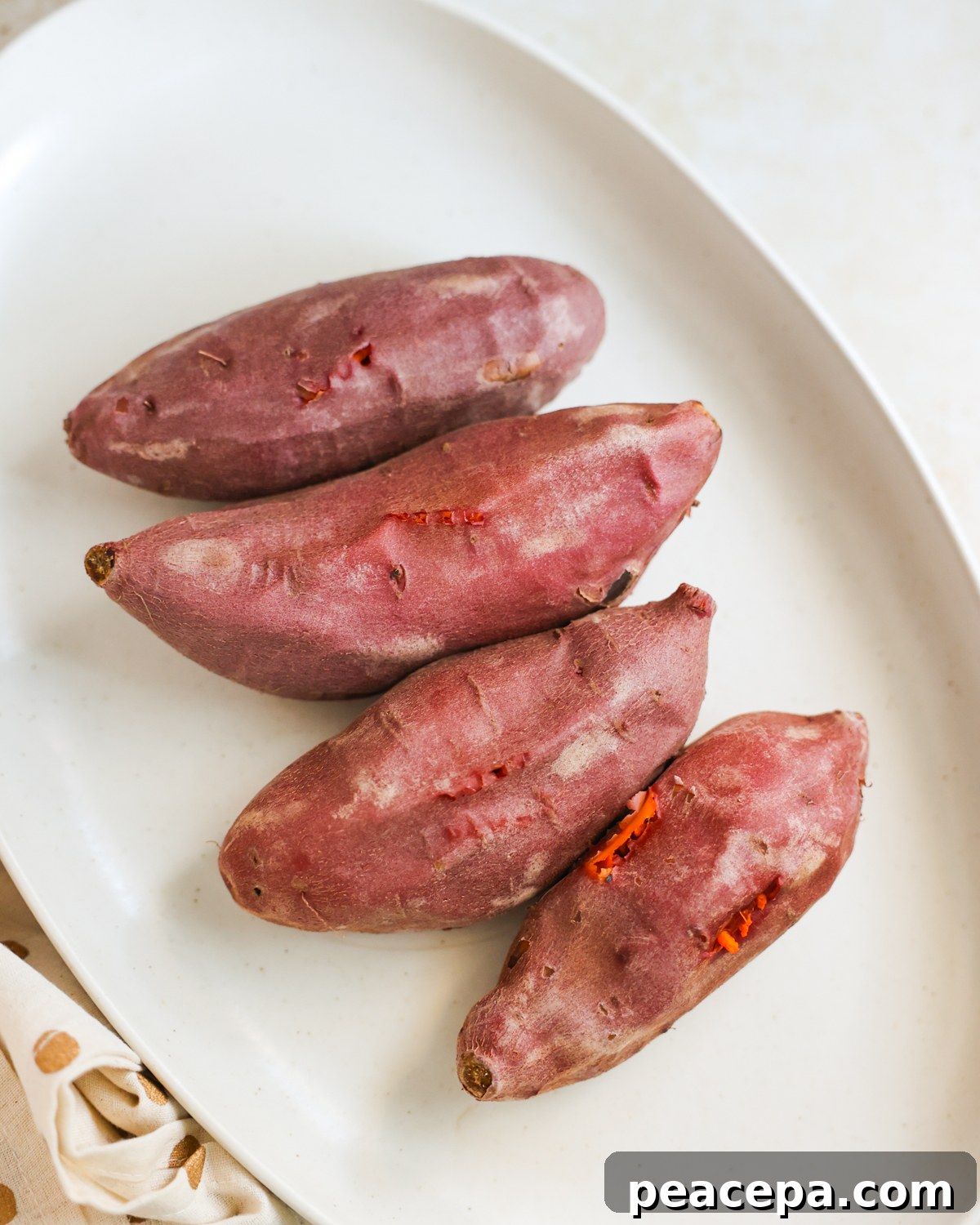 overhead sweet potatoes cooling on a platter