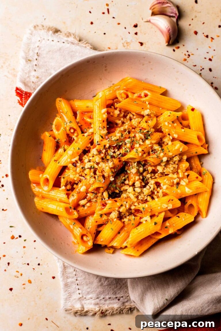 Penne pasta with Vegan Arrabbiata Sauce in a bowl.