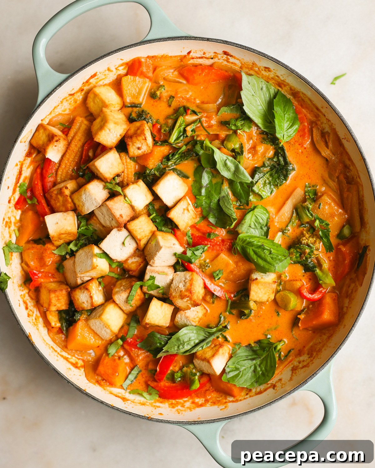Pumpkin curry in a pan.