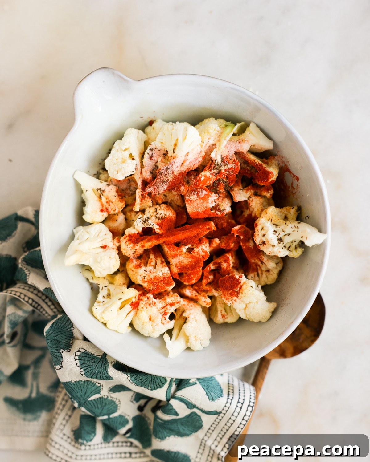 cauliflower in bowl with spices