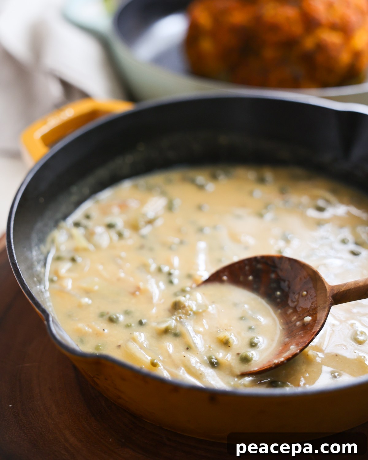close up of piccata sauce in pan