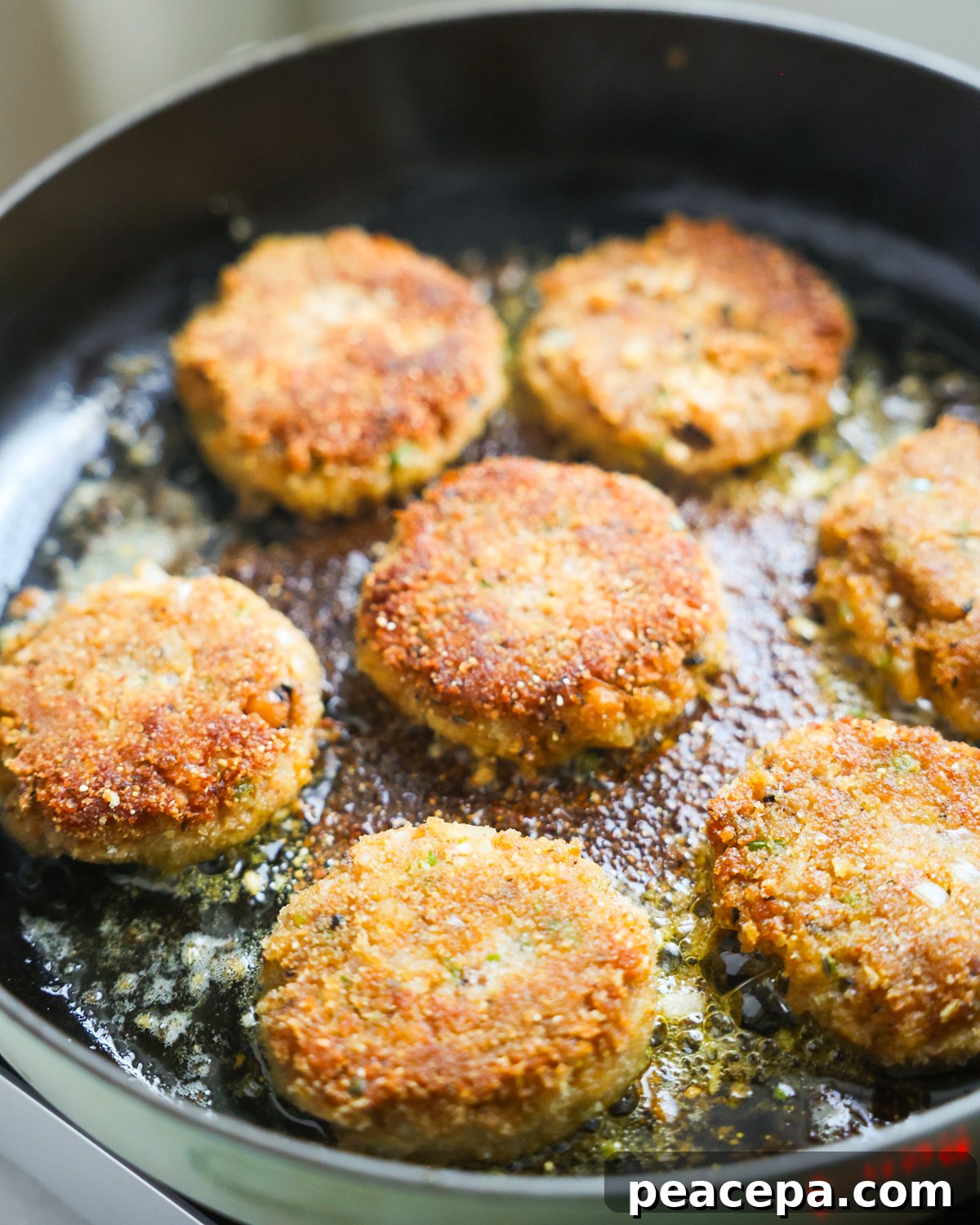 Black eyed pea fritters frying.