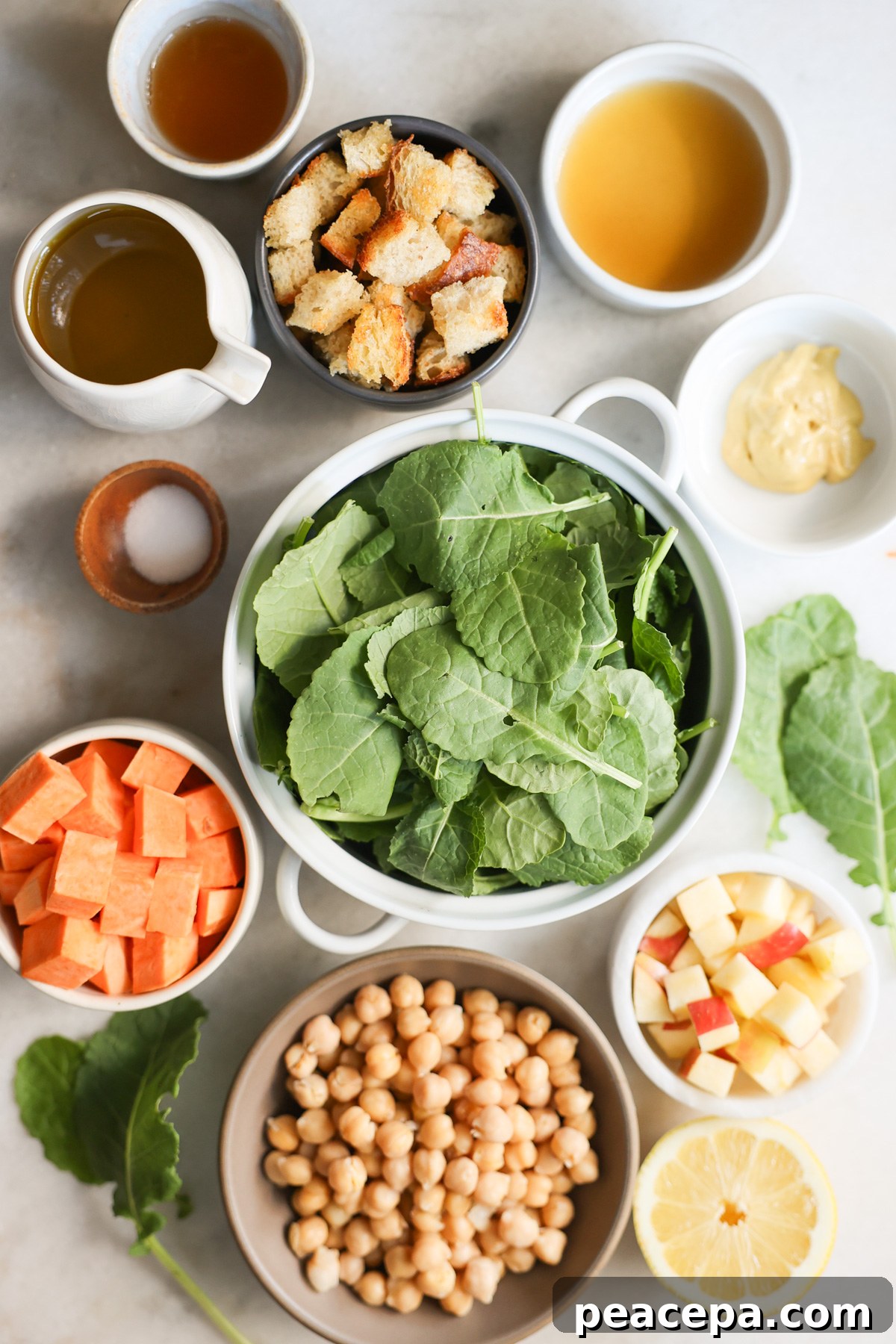 overhead of ingredients for baby kale salad