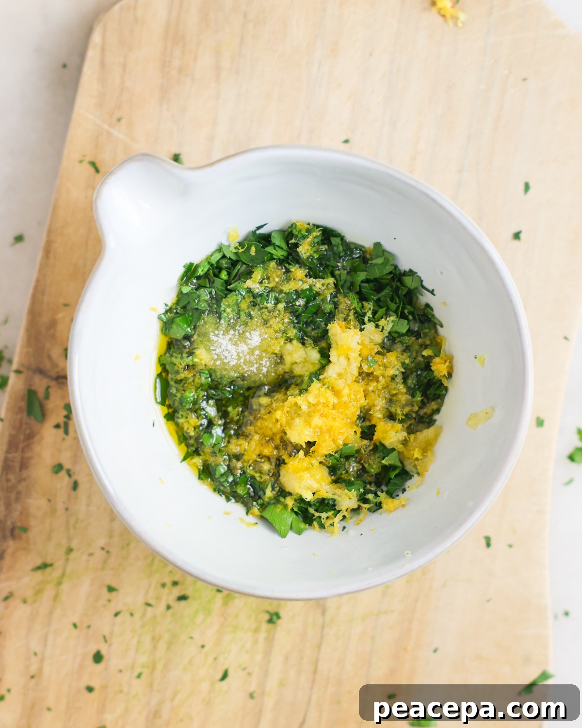 Gremolata ingredients in bowl.