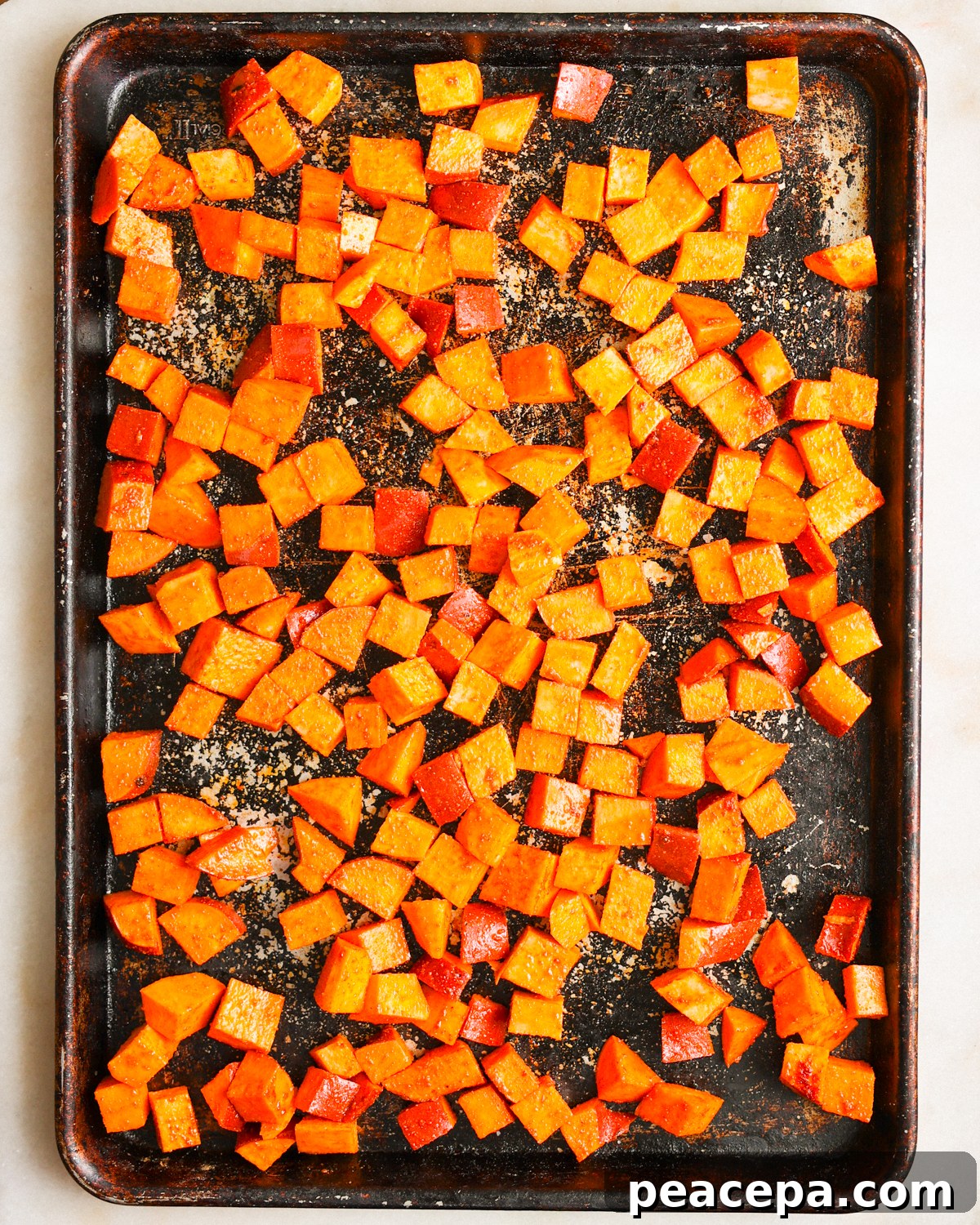 sweet potatoes on baking sheet