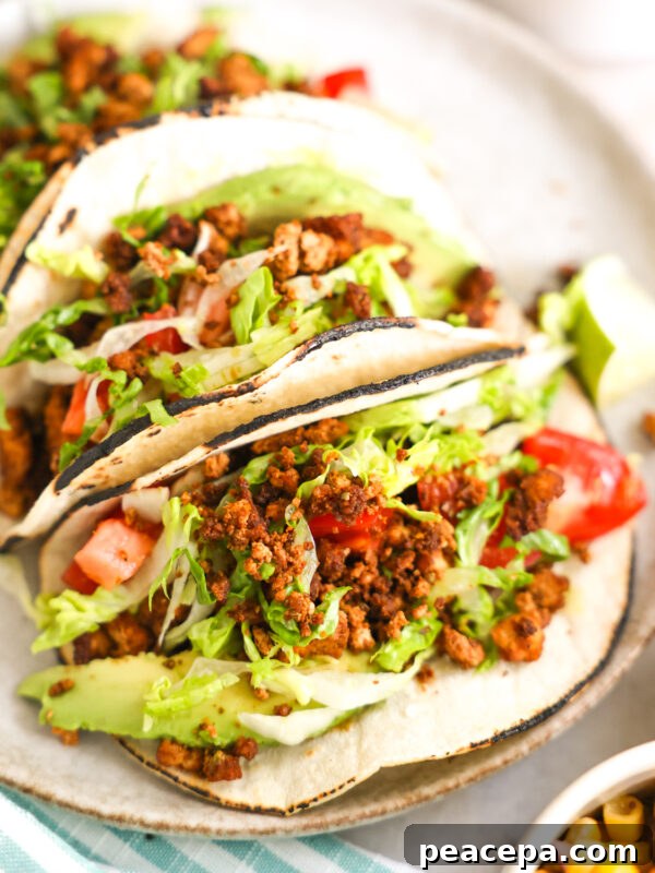close up tofu tacos on plate