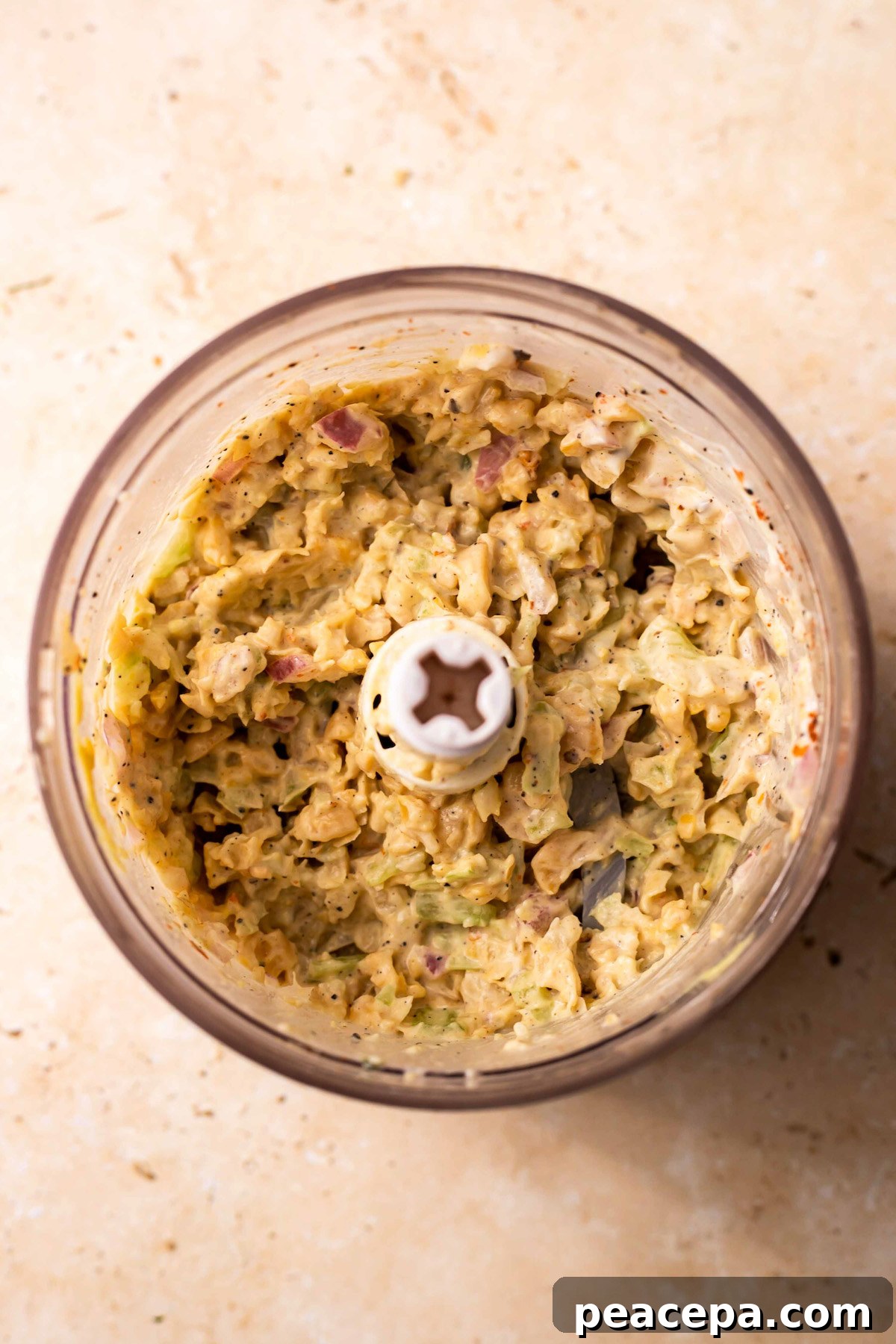 Chickpea tuna salad in a food processor.