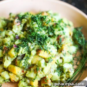 close up of cucumber avocado salad