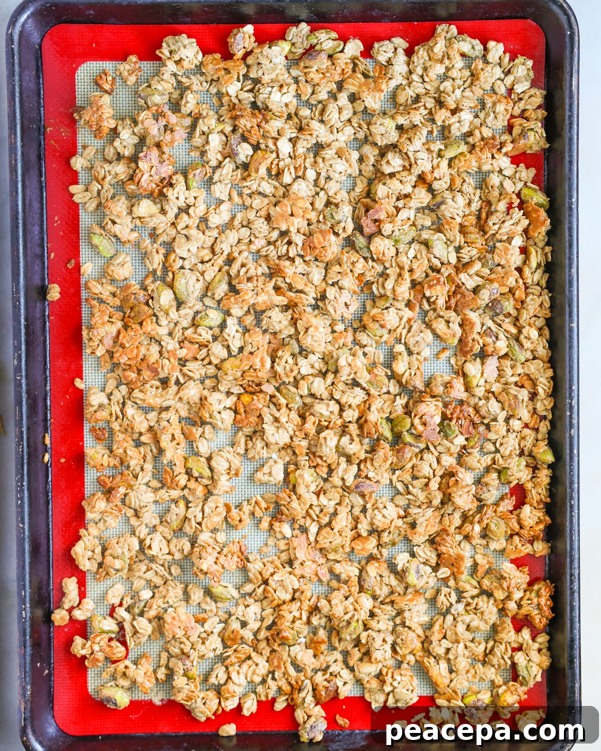 overhead tahini granola on baking sheet