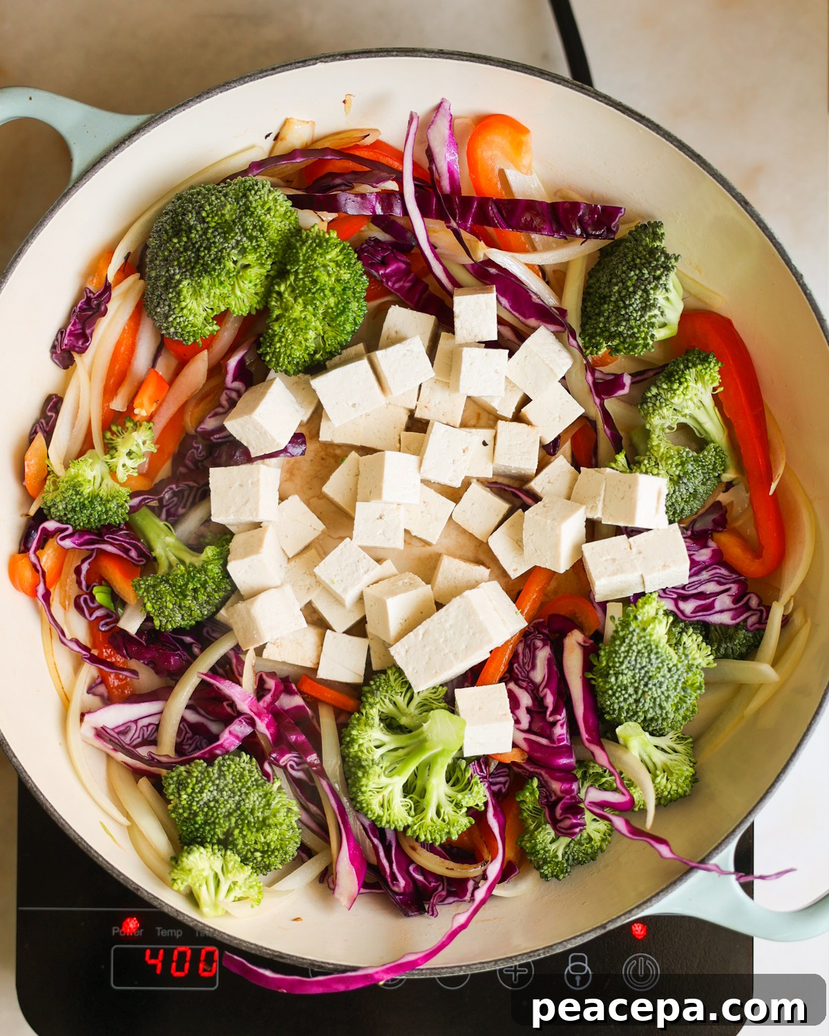 overhead tofu added to pan