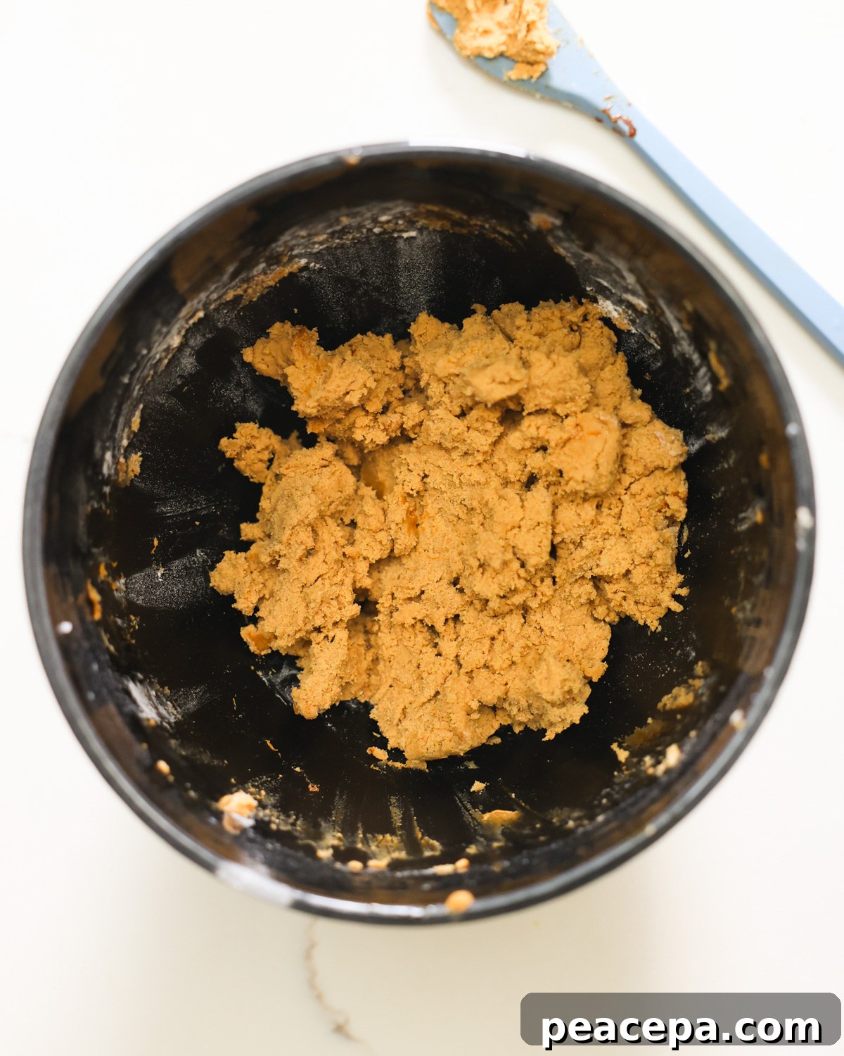 overhead gingerbread cookie dough in bowl