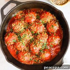 Vegan meatballs in a skillet.