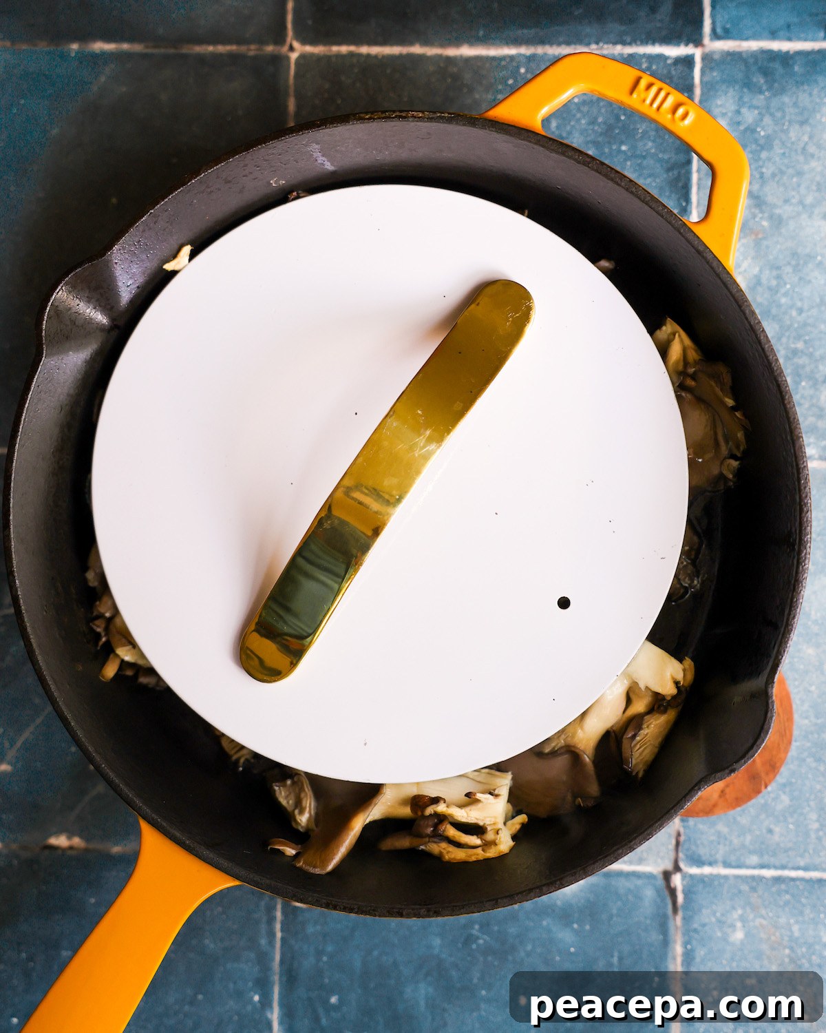 pressing mushrooms with heavy lid