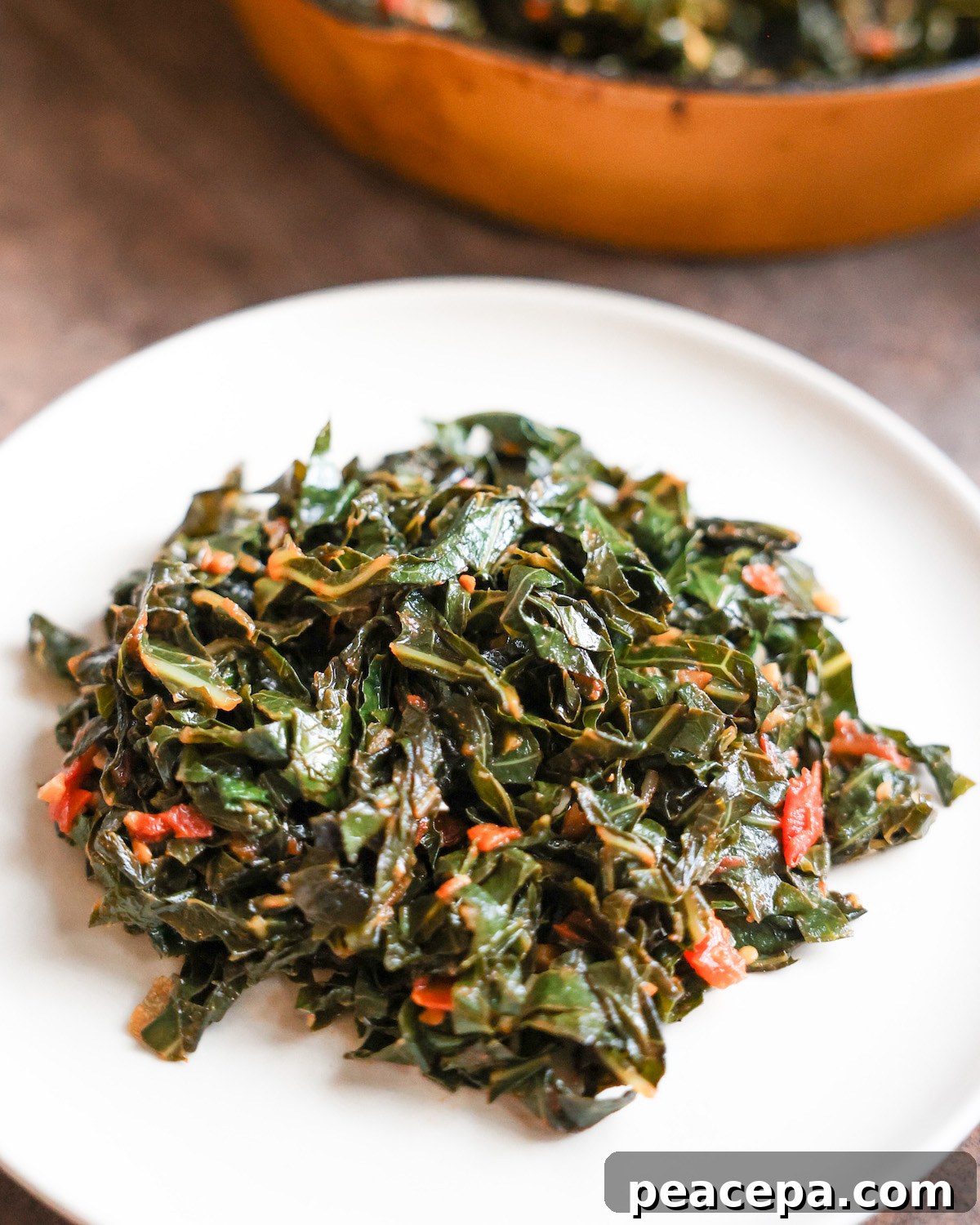 Vegan collard greens served on a plate.