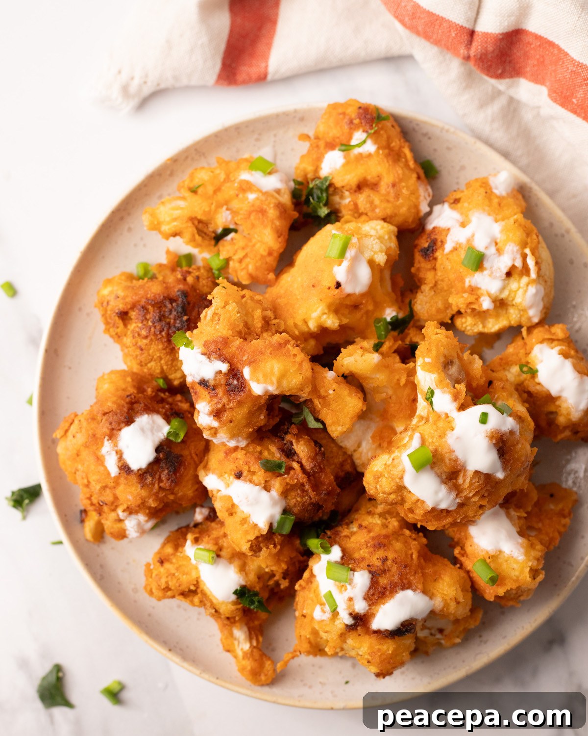 vegan cauliflower fried chicken on a white plate