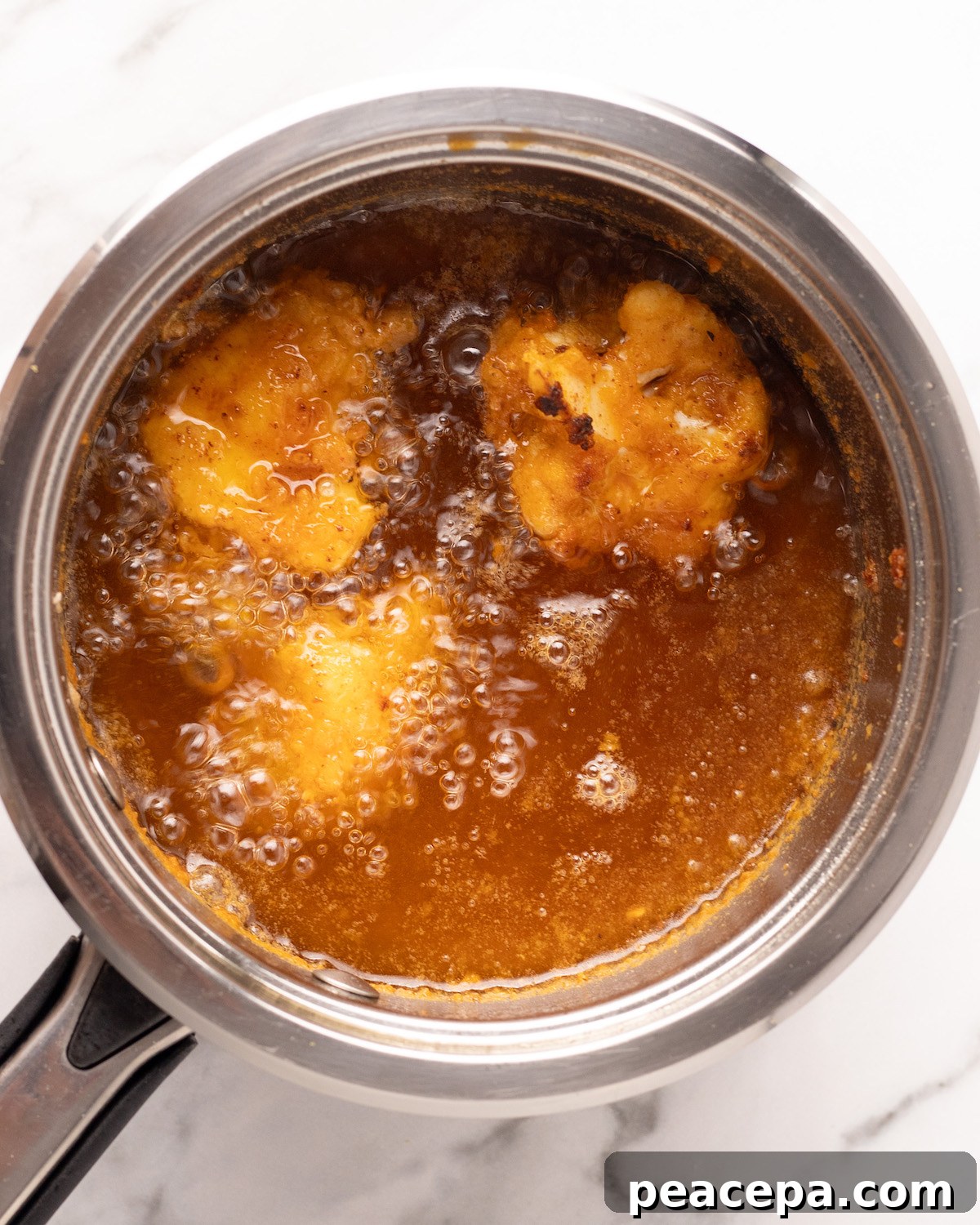 overhead of cauliflower frying 