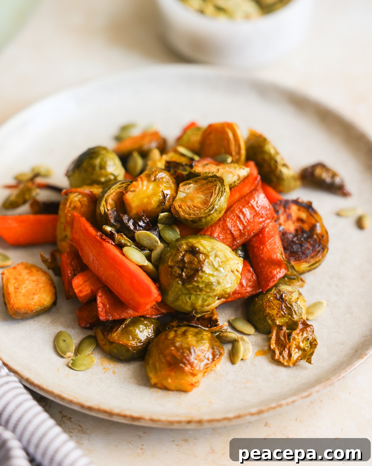 plate of brussels sprouts and carrots