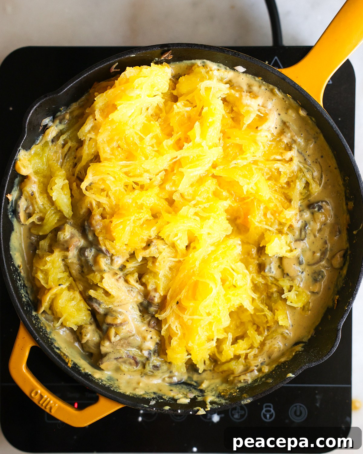 spaghetti squash added to skillet