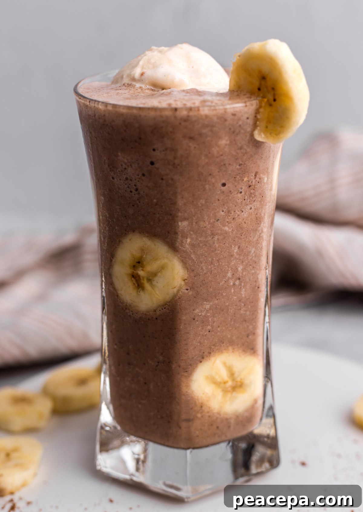 chocolate vegan milkshake in a tall glass
