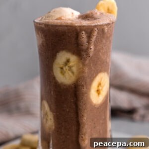 tall glass of mocha vegan milkshake