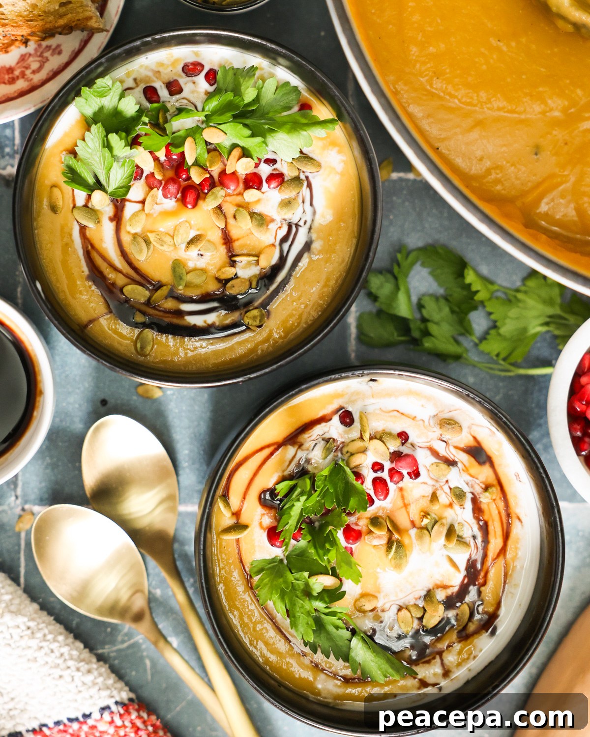 overhead of bowls of coconut butternut squash soup