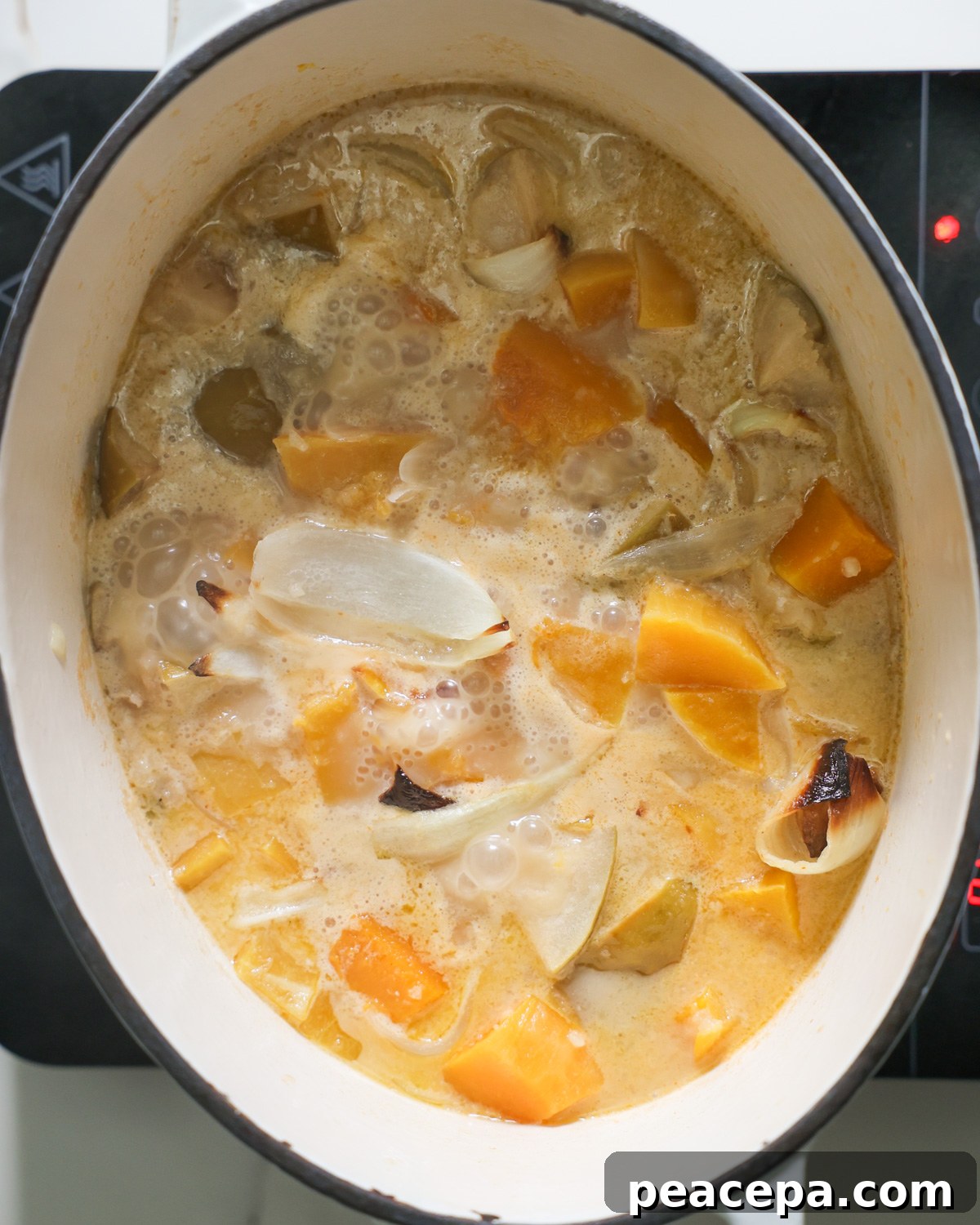butternut squash soup simmering on stove