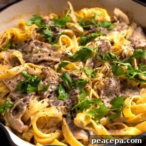close up of vegan mushroom alfredo in pan