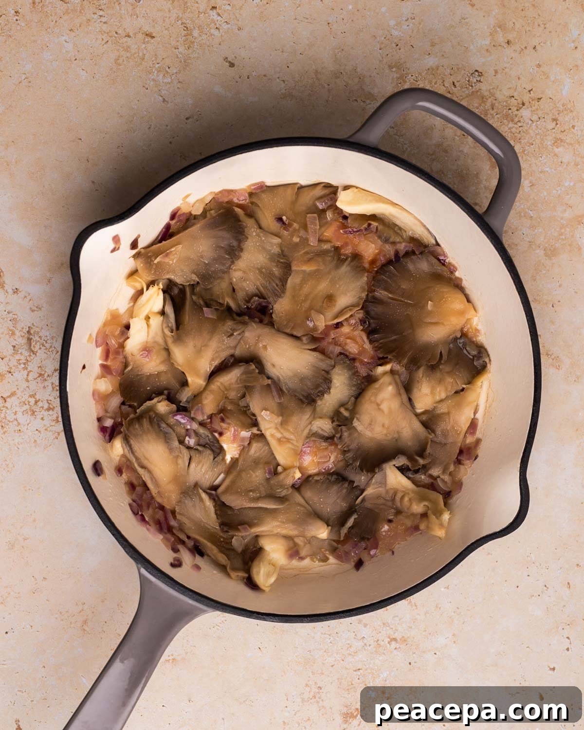 sautéing mushrooms in pan