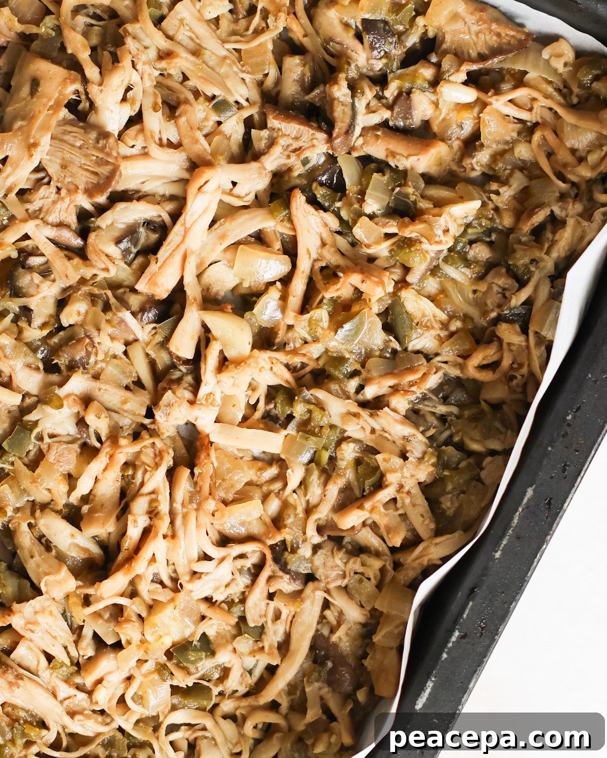 close up of vegan carnitas on a baking sheet