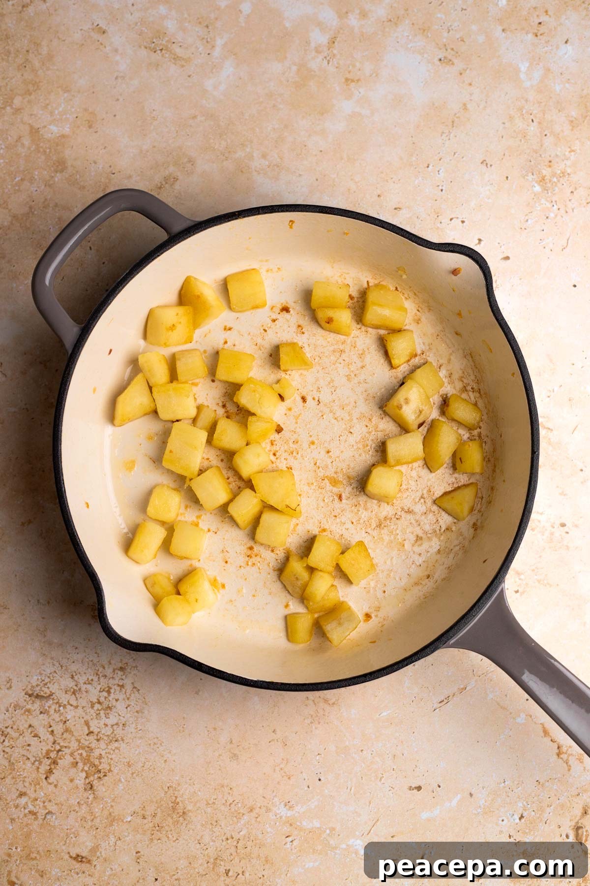 sautéed sweet potato in a skillet