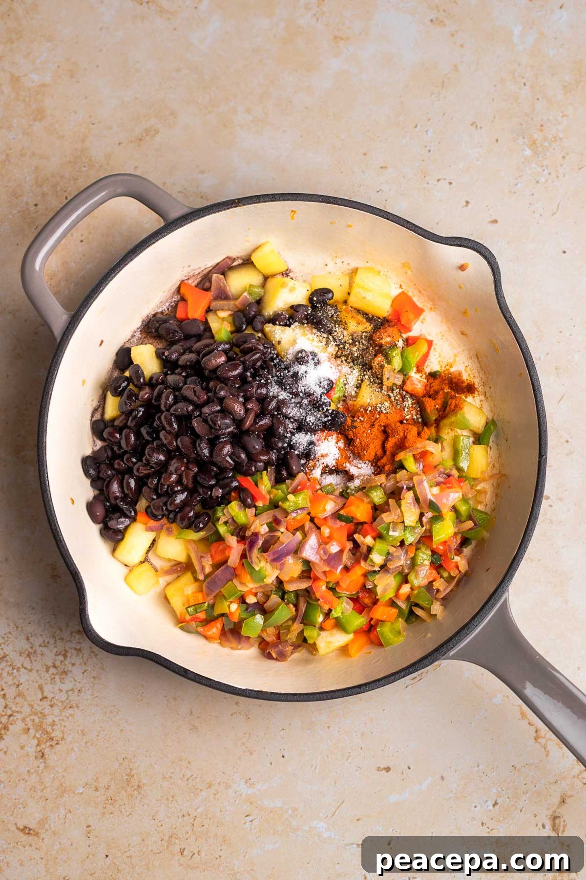overhead of beans added to sweet potato breakfast hash