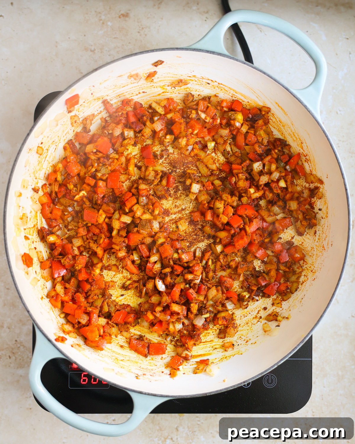 overhead spices and aromatics in pan