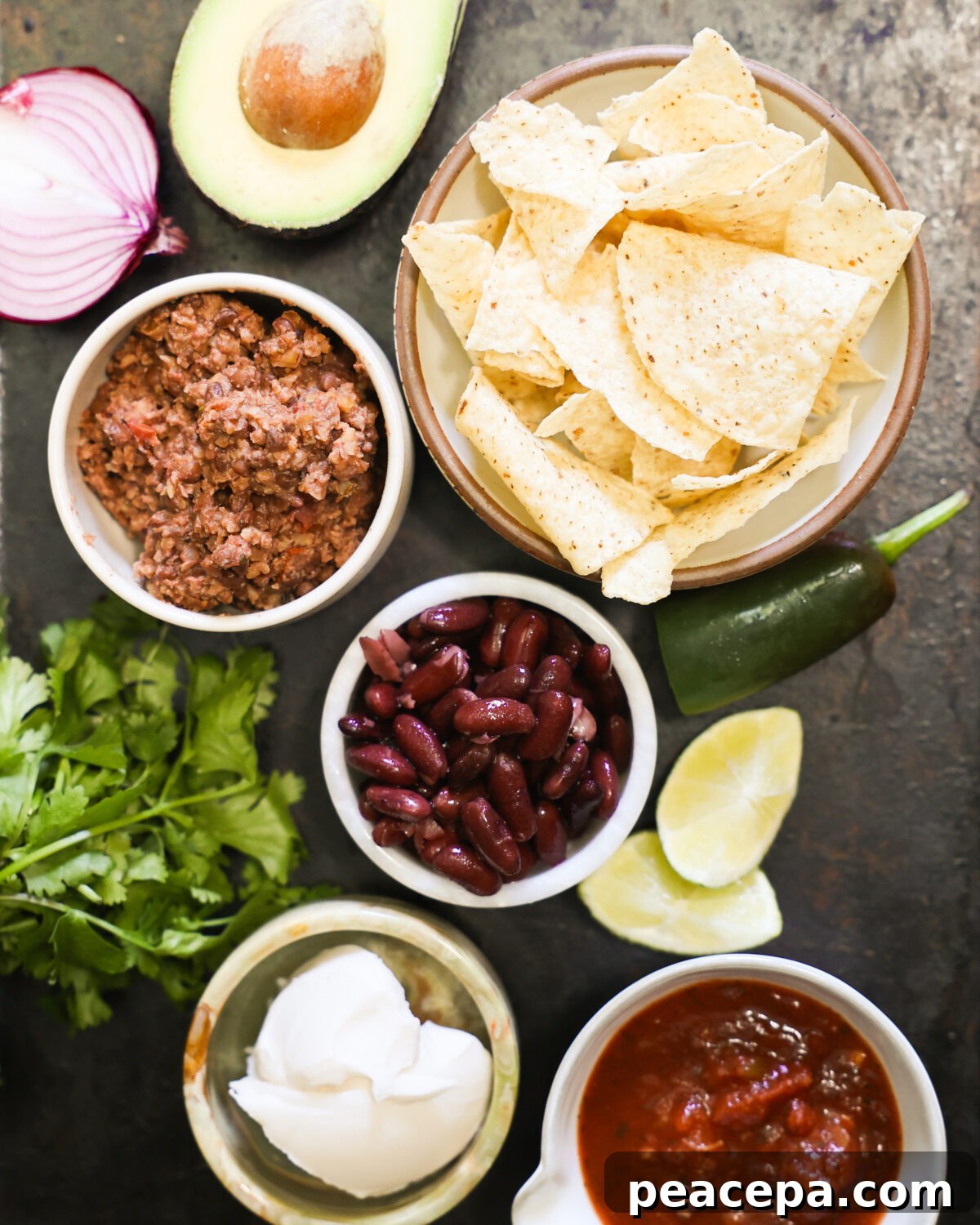 All of the ingredients to make vegan nachos.