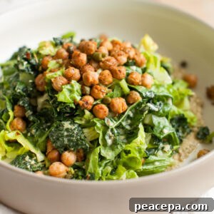 Vegan caesar salad in a white bowl.