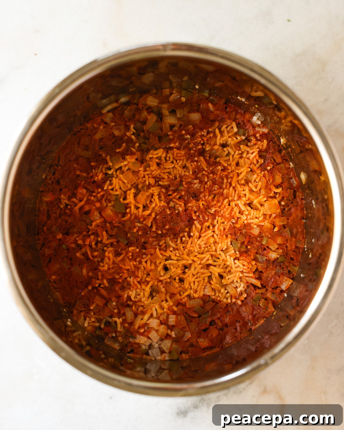 overhead of mexican rice in instant pot right after cooking
