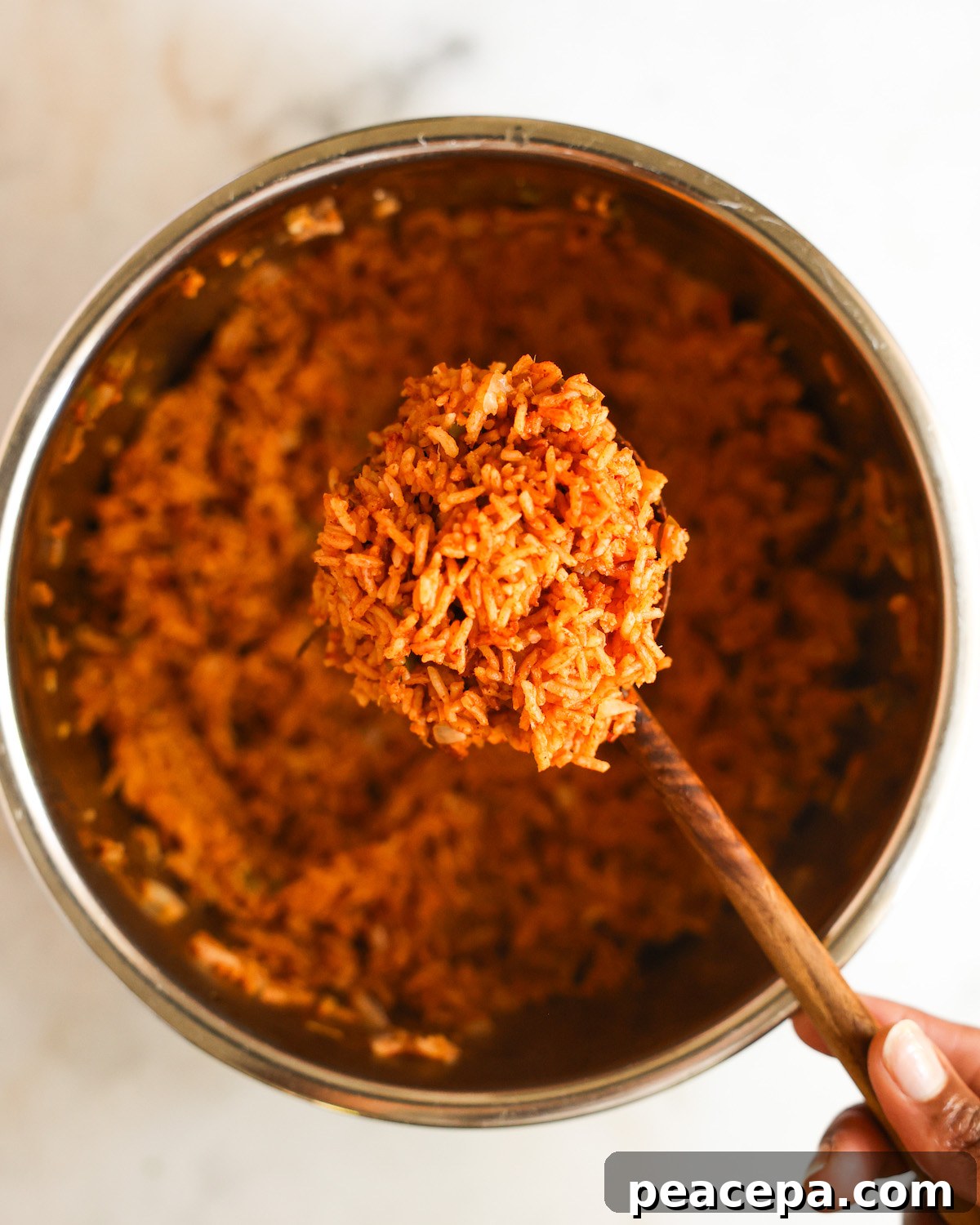 overhead of scoop of instant pot mexican rice