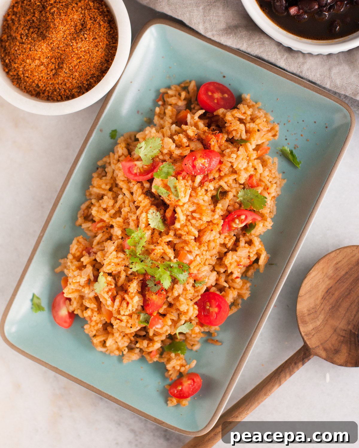 overhead of instant pot Mexican rice on a turquoise plate