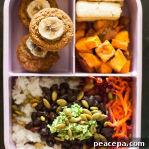 overhead of a bento box filled with vegan food